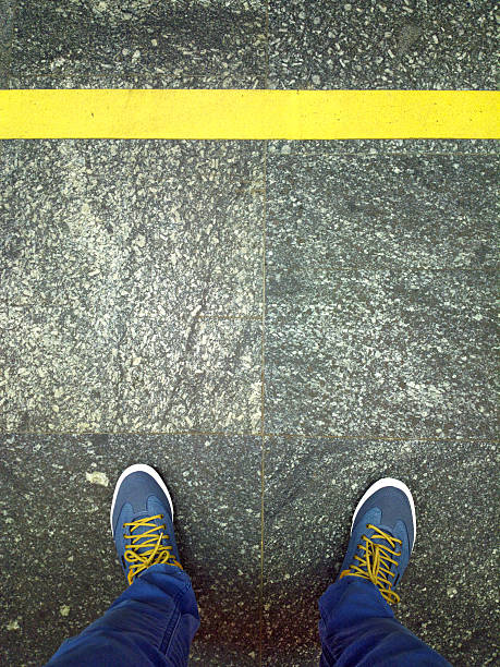 istock Feet near yellow line. 537307542