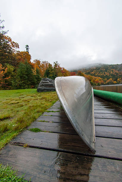 istock Bow of canoe on rainy day 537309432