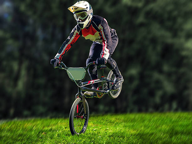 istock Man riding bmx bike performing a trick 537311152