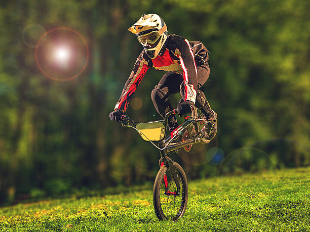 istock Man riding bmx bike performing a trick 537311300