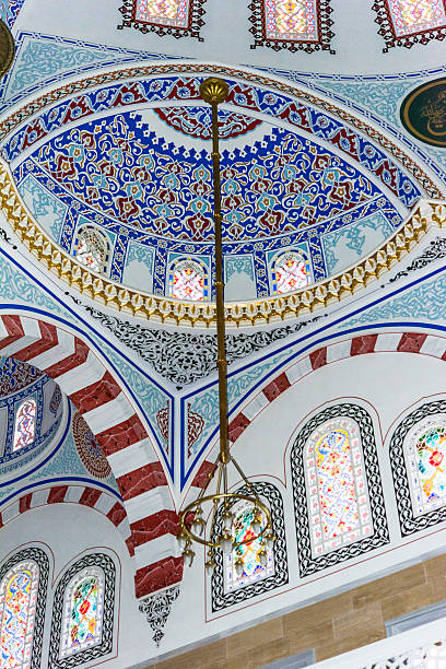mosque interior detail from vaulted ceil stock photo