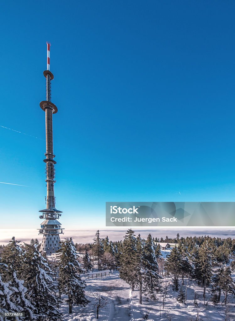Ochsenkopf (Fichtelgebirge) View over the summit of the Ochsenkopf (Fichtelgebirge / Fichtel Mountains) on the TV tower and ski station on a beautiful winter day. Upper Franconia Stock Photo