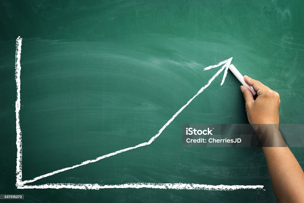 chalkboard with finance business graph Writing chalk color chart shows an increase in business. 2015 Stock Photo