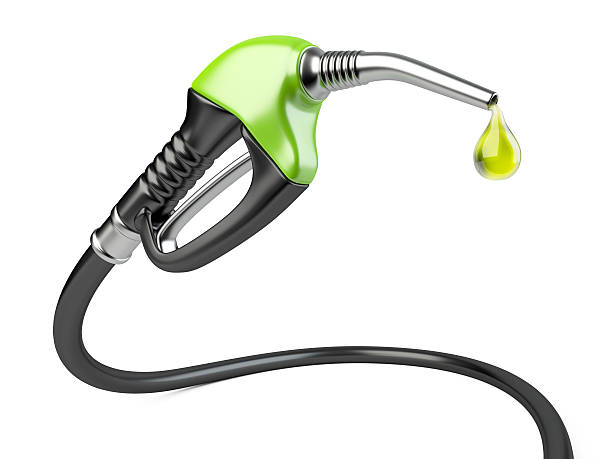 istock Green fuel pump nozzle with drop oil. 537315591