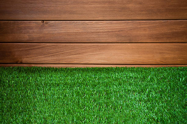istock Grass and wood wall, natural background 537315861