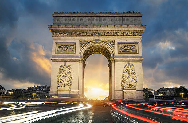 istock View of famous Arc de Triomphe at sunset 537316199