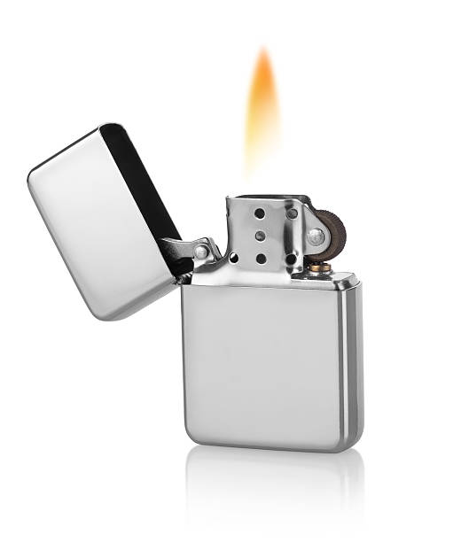 Metal lighter Metal lighter isolated on a white background cigarette lighter stock pictures, royalty-free photos & images