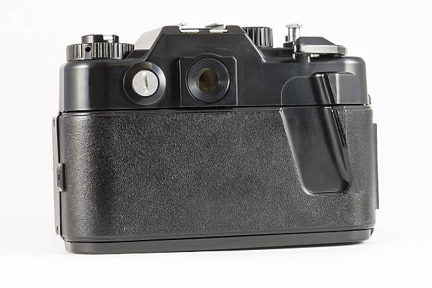 istock Back view if old film SLR camera on white background 537317401