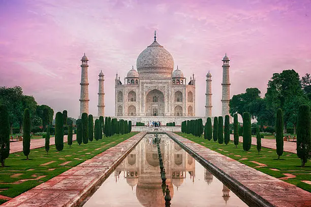 The Taj Mahal is a mausoleum located in Agra, India. It is one of the most recognizable structures in the world. Taj Mahal is regarded as one of the eight wonders of the world.