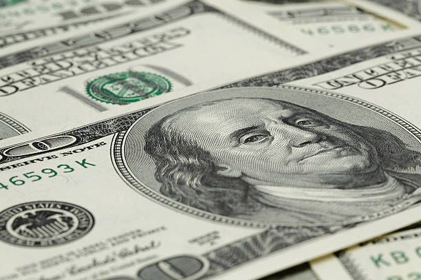 istock lots of one hundred dollar banknotes, background 537318069