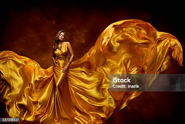 Fashion Model Woman Dress Fluttering Silk Beauty Gown Waving Fabric Stock Photo - Download Image Now