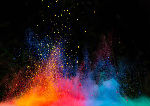 launched colorful powder over black