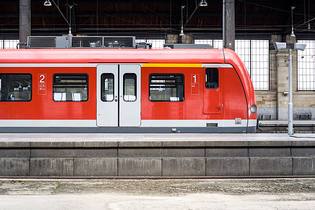 Waiting S-Bahn, railroad station Waiting S-Bahn on railroad station platform railroad station platform stock pictures, royalty-free photos & images