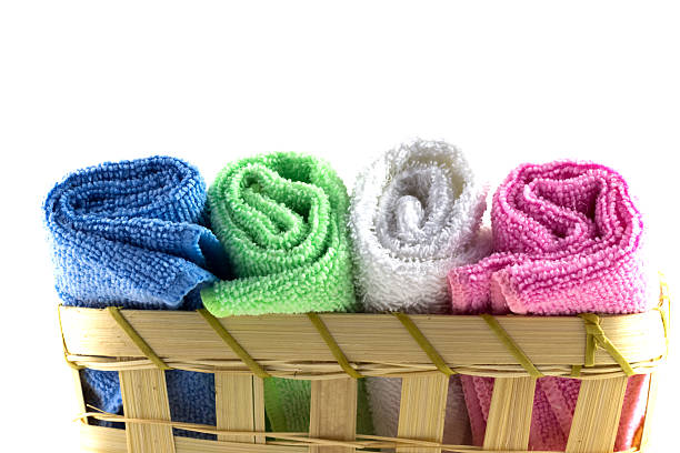istock Colorful towels in rolls on a white background 537318693