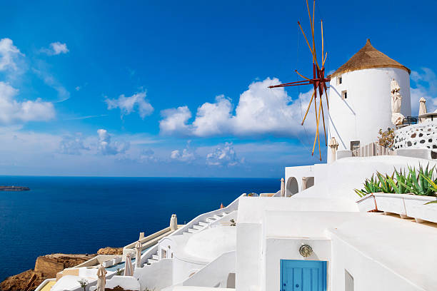 istock View of a windmill in Santorini, Greece 537318706