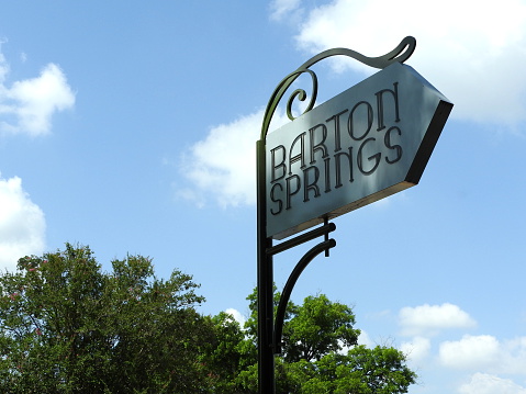 The sign for Barton Springs, a public spring-fed pool in Austin, Texas