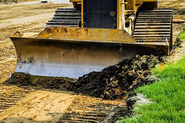 istock Close-up of a bulldozer blade at a resurfacing project 537321156