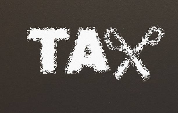 istock tax cut finance blackboard sign 537321484
