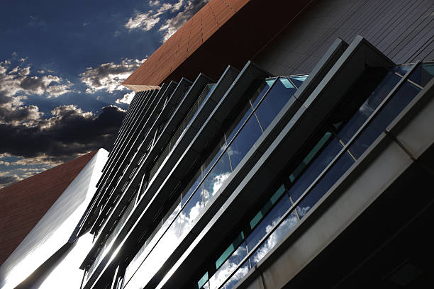 istock Blue Cloudy Sky Reflecting Off Building's Windows 537322618