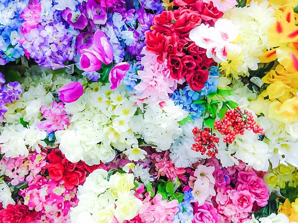 istock colorful silk flowers background 537323404