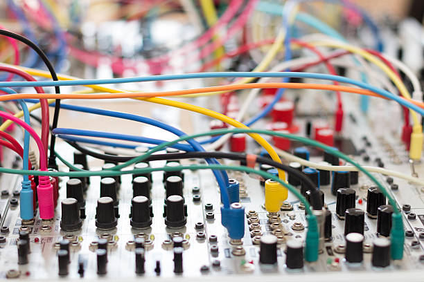 many cables connected on analog synthesizer - modular many cables connected on analog synthesizer - modular synth synthesizer stock pictures, royalty-free photos & images