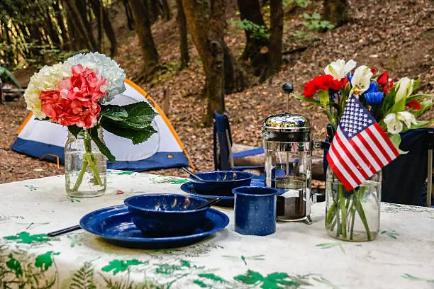 Table set for camping with American flags
