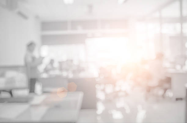 istock Businessmen blur in the workplace.Table Top And Blur Office . 537327610
