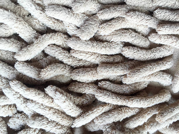 istock Old dirty doormat for clean and wipe foot. Background texture 537328464
