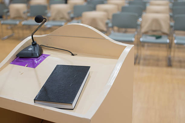 istock book at podium speech and micphone 537328860