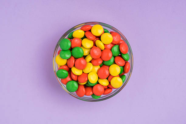 istock Orange, Yellow, and Green Chocolate Candies 537332028