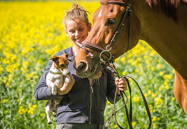 istock girl with her pets 537332658
