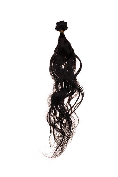 naturalne falowane włosy-brazilian przedłużenia. - human hair curled up hair extension isolated zdjęcia i obrazy z banku zdjęć