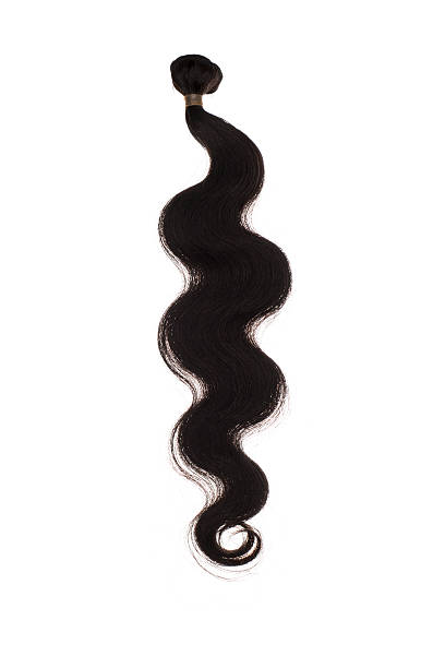 ciało falowane włosy-brazilian przedłużenia. - human hair curled up hair extension isolated zdjęcia i obrazy z banku zdjęć