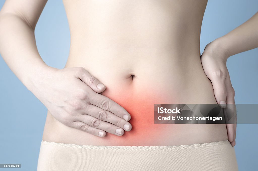 Stomach ache Young woman having stomach ache Endometriosis Stock Photo