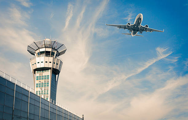 Air Trafic Control tower and airplance at Paris Airport stock photo