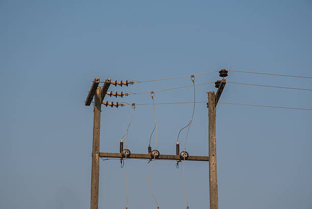 istock Electricity pylon on blue sky background 537339648