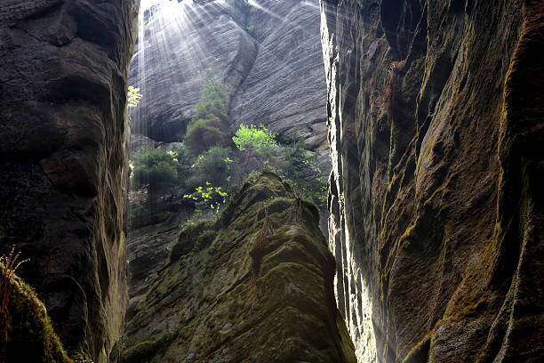 istock Gap in the rock mountains and rays of light 537340226