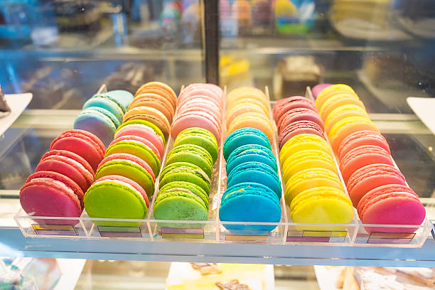 istock French macarons for sale on glass showcase 537343790
