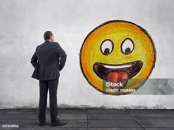 Businessman And Face With Stuckout Tongue Emoji Stock Photo - Download Image Now - Anthropomorphic Smiley Face, Icon, Graffiti