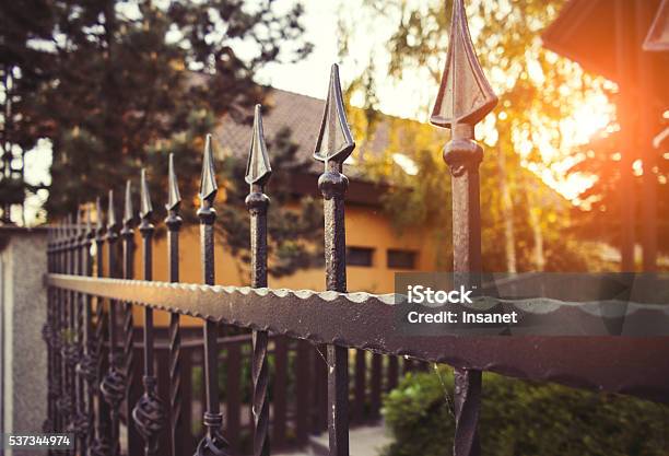 Wrought Iron Fence Stock Photo - Download Image Now - Fence, Gate, Iron - Metal