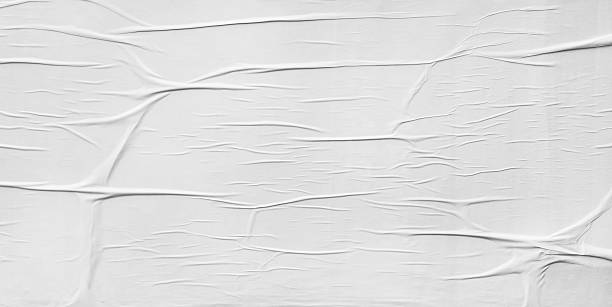 istock Wrinkled paper glued on wall texture 537345228