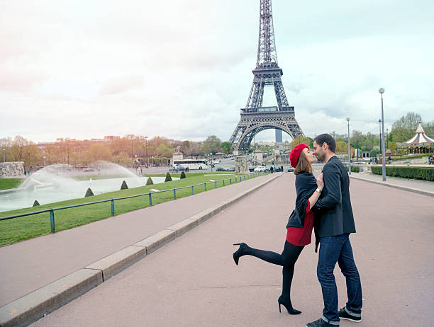istock Young couple in love at Eiffel Tower 537346142