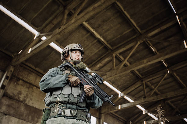 istock soldier stands and watches the territory 537347809