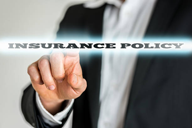 istock Businessman Pointing Glowing Insurance Policy Text 537348183