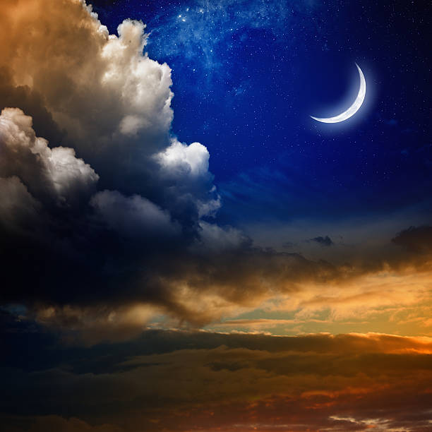 Sunset and new moon Beautiful nature background - new moon in dark blue sky with stars, glowing sunset clouds. Elements of this image furnished by NASA nasa.gov crescent photos stock pictures, royalty-free photos & images