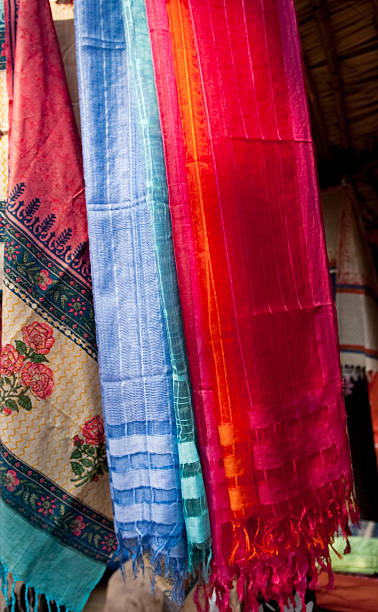 istock Multi-colored scarves at local market, India 537349583