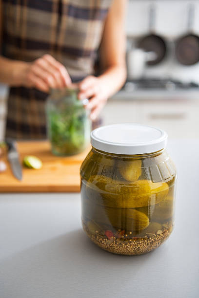 istock Jar of marinated cucumbers on table. Closeup 537349735