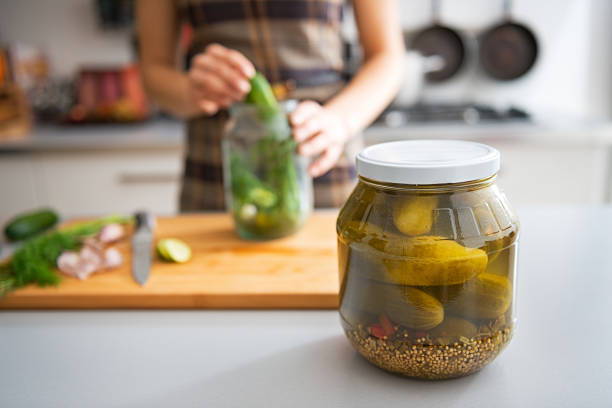 istock Jar of marinated cucumbers on table. Closeup 537349737