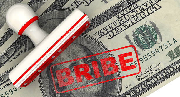 istock Bribe. Seal and imprint on American banknote 537350229