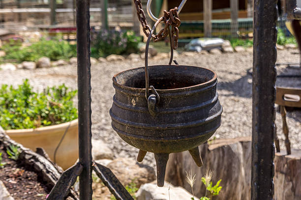 istock Old cast iron pot on a three legs, Israel 537350242
